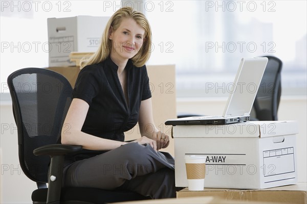 Businesswoman in new office.