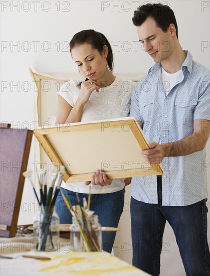 Couple looking at artwork.