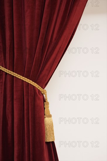 Close up of curtain and tieback.