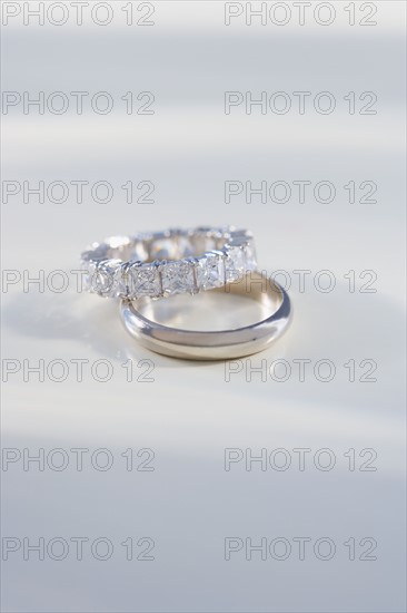 Close up of engagement and wedding rings.