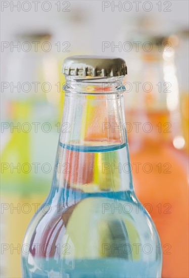 Close up of glass soda bottles.