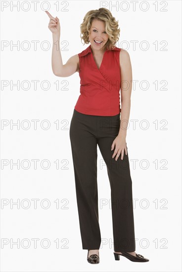 Woman pointing finger in air.