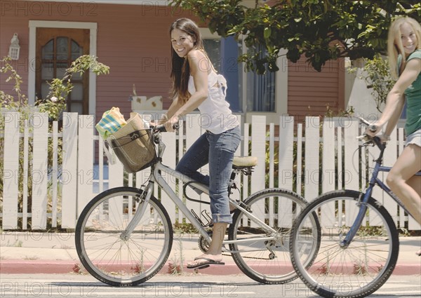 Teens riding bikes. Date : 2006