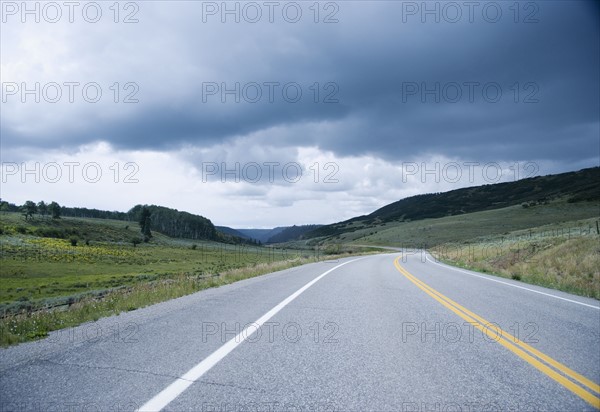 Storm clouds over Route 145 outside Telluride Colorado USA. Date : 2006