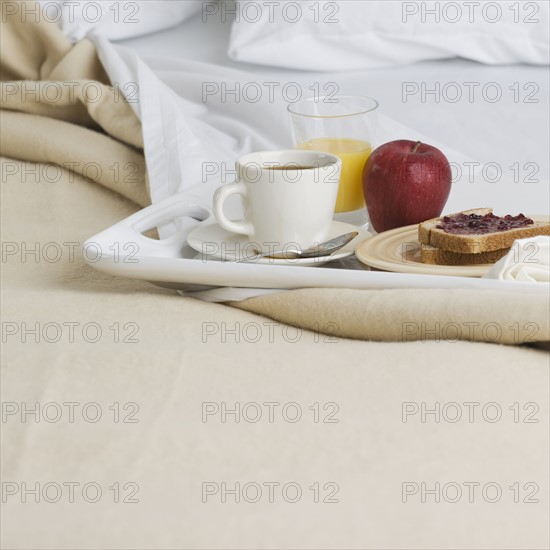 Still life of breakfast tray on bed. Date : 2006