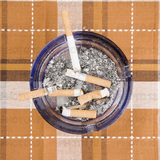 Still life of cigarettes in ashtray. Date : 2006