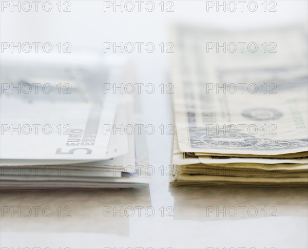 Stacks of Euros and American dollars. Date : 2006