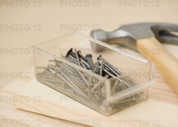 Close up of hammer and nails. Date : 2006