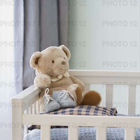 Teddy bear in crib. Date : 2007