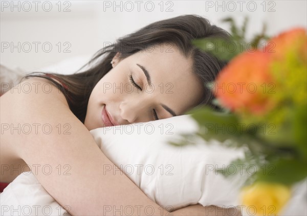 Woman sleeping in bed. Date : 2007