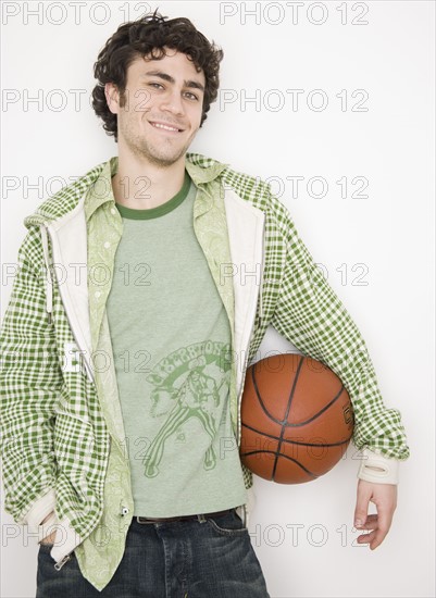 Man holding basketball. Date : 2007