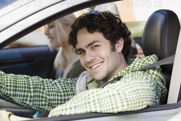 Man sitting in driver’s side of car. Date : 2007