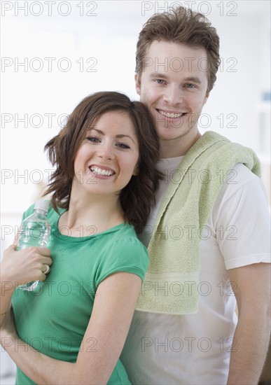 Couple with towel and water bottle. Date : 2007