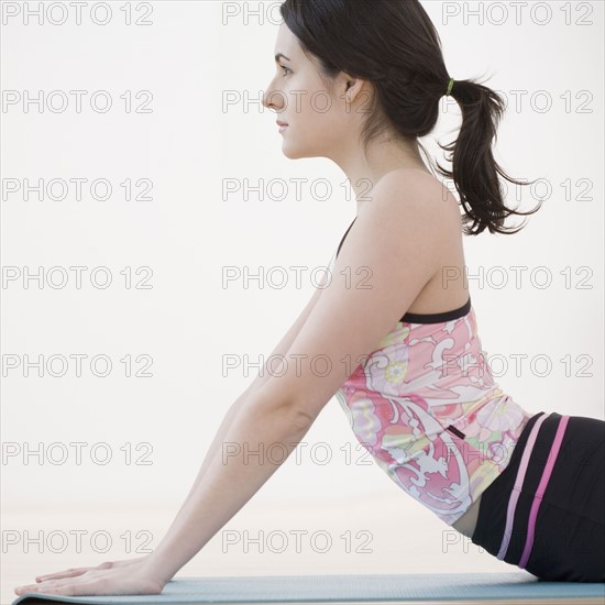 Woman practicing yoga. Date : 2007