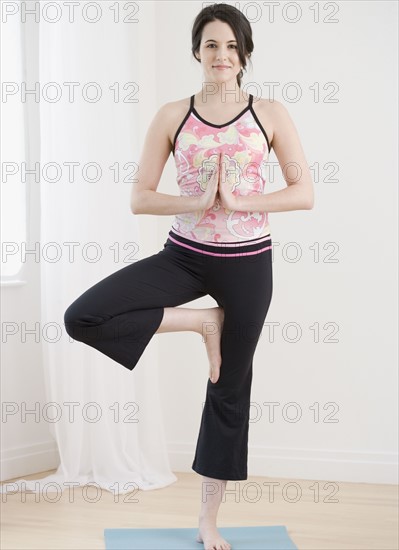 Woman practicing yoga. Date : 2007