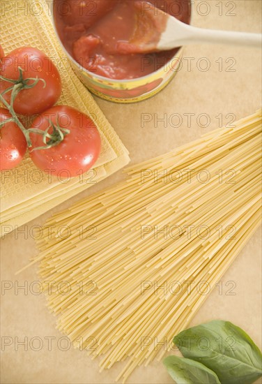 High angle view of pasta and tomatoes. Date : 2006