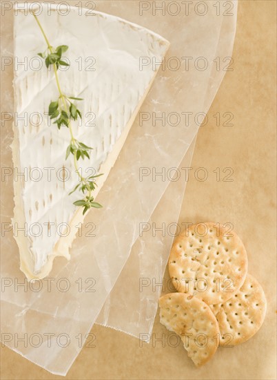 High angle view of crackers and cheese. Date : 2006