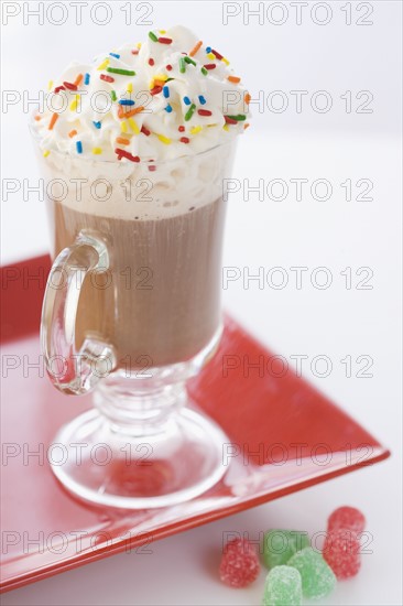Close up of milkshake and gumdrops. Date : 2006