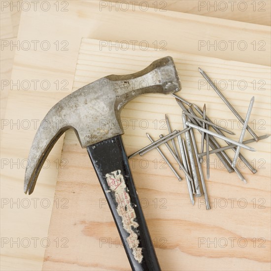 Close up of hammer and nails. Date : 2006