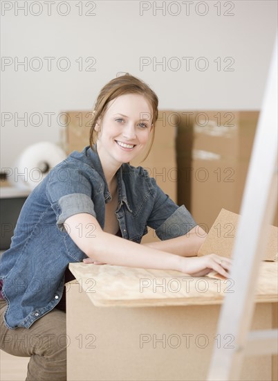 Portrait of woman in new house. Date : 2006