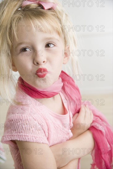 Young girl playing dress-up. Date : 2006