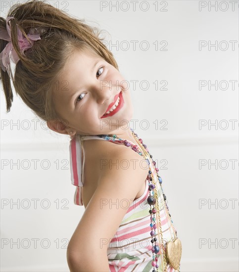 Young girl playing dress-up. Date : 2006