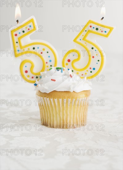 Special cupcake with candles for 55. Date : 2006