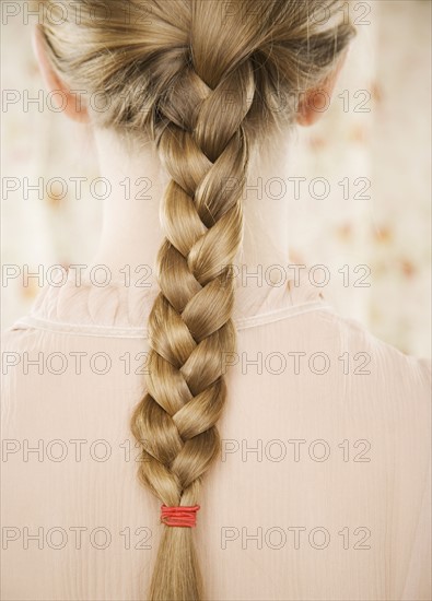 Close up of braid down a woman’s back. Date : 2006