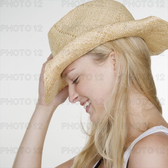 Woman wearing cowboy hat. Date : 2006