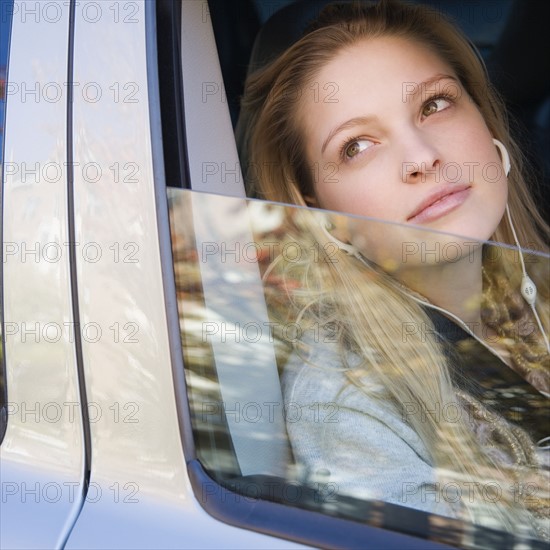 Female passenger sitting in car. Date : 2006