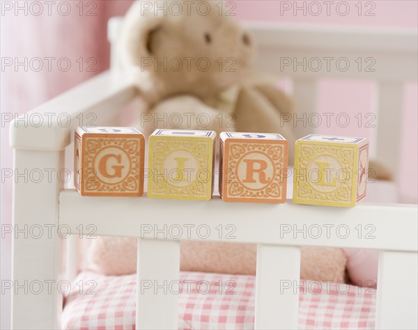 Girl spelled out with blocks on crib. Date : 2007