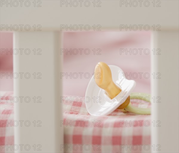 Close up of pacifier in crib. Date : 2007