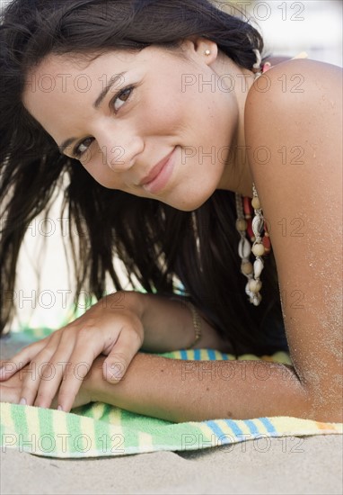 Woman lying on beach. Date : 2006