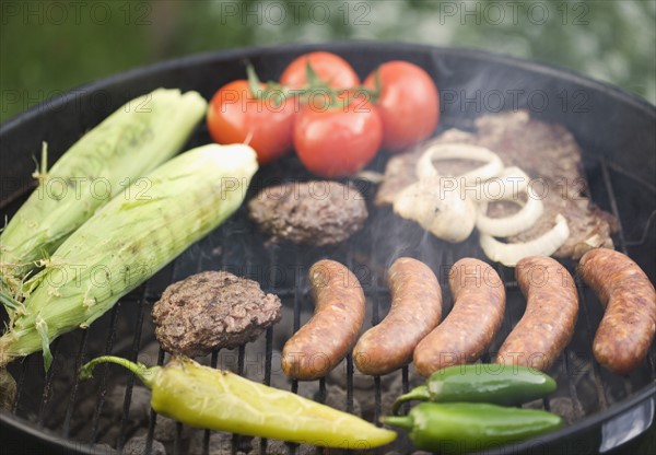 Food cooking on a grill. Date : 2006