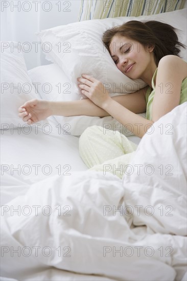 Woman sleeping in bed. Date : 2007