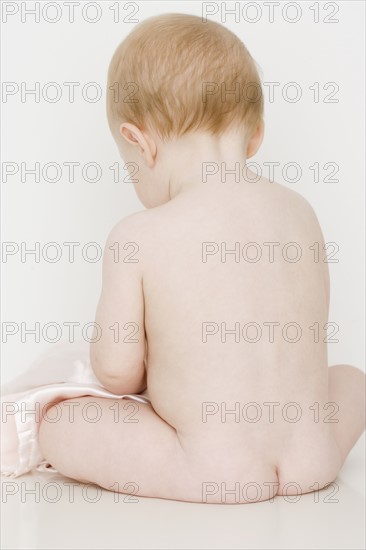 Rear view of nude baby. Date : 2007