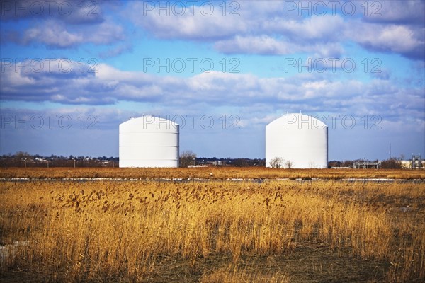 Cylindrical containers in rural area. Date : 2007