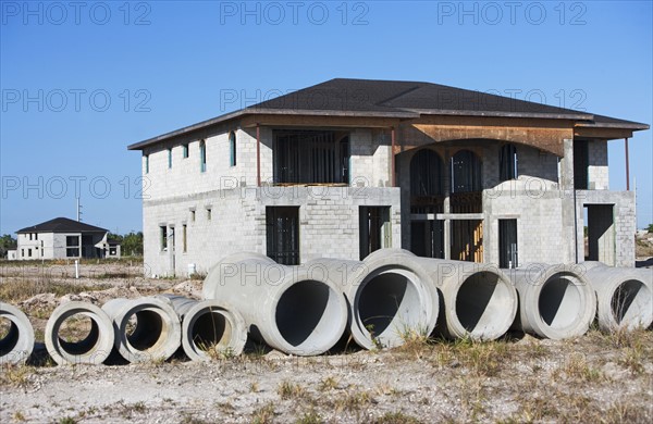 Concrete pipes at residential construction site. Date : 2007