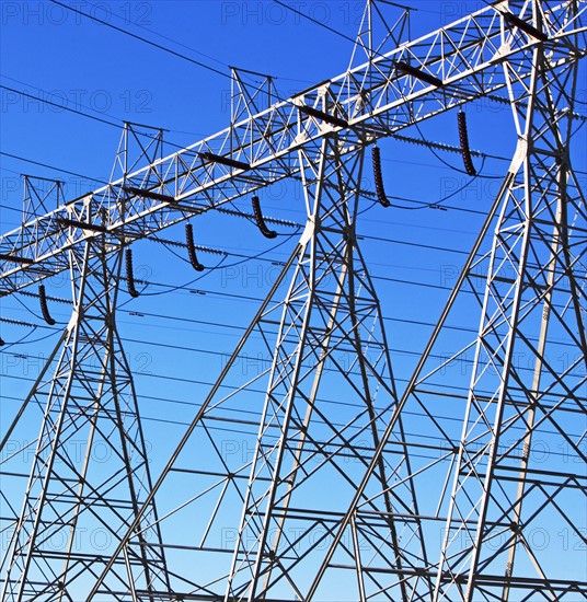 Low angle view of electrical poles. Date : 2007