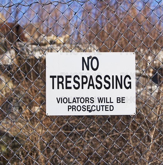 No Trespassing sign on fence. Date : 2007