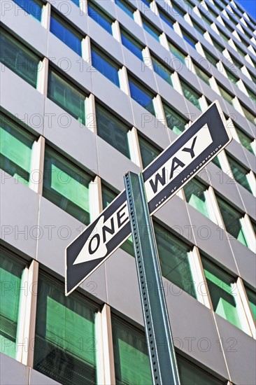 Low angle view of One Way sign. Date : 2007