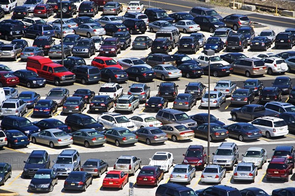 cars parked in lot. Date : 2007