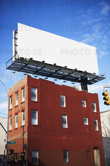 Blank billboard on urban building. Date : 2007