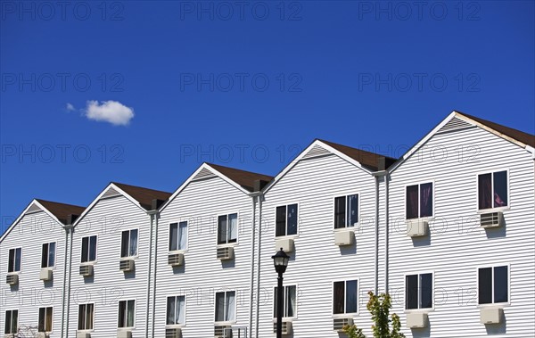 Row houses under blue sky. Date : 2007
