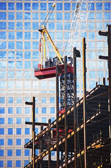 Urban construction site with crane. Date : 2007