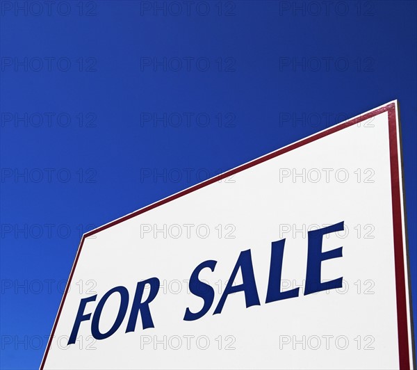 Low angle view of For Sale sign. Date : 2007