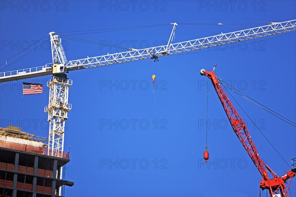 Cranes under blue sky. Date : 2007