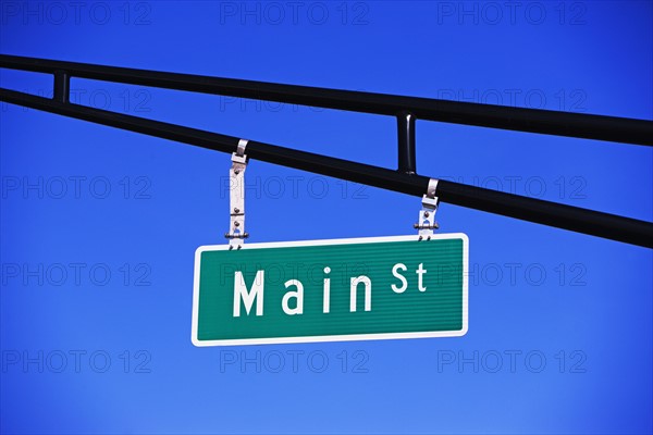 Main Street sign under blue sky. Date : 2007