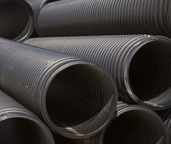 Stack of large metal pipes. Date : 2007