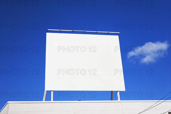 Blank billboard under blue sky. Date : 2007